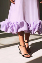 Valeriah | Vestido largo con volantes y escote en V – invitada perfecta