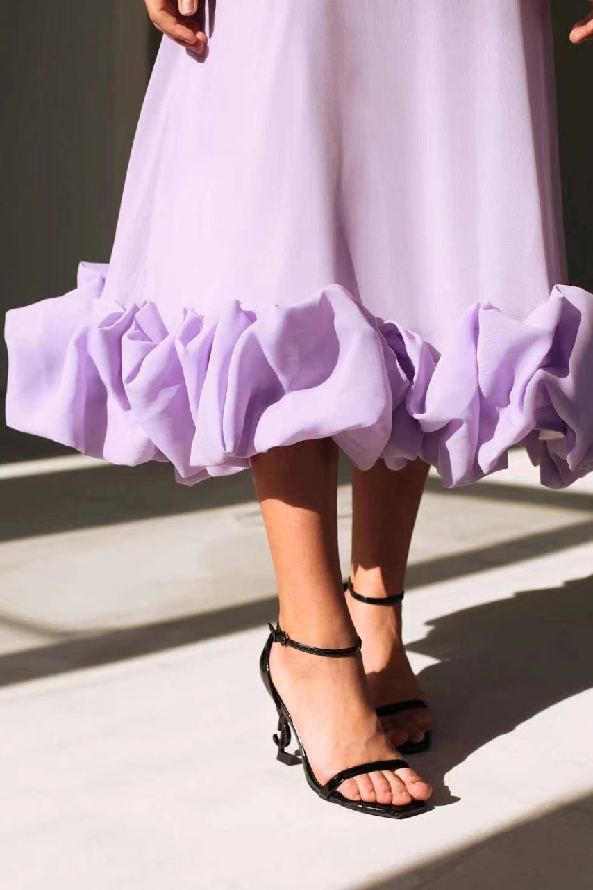 Valeriah | Vestido largo con volantes y escote en V – invitada perfecta