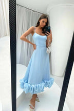 Valeriah | Vestido largo con volantes y escote en V – invitada perfecta