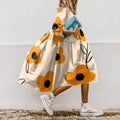 Araceli | Vestido midi holgado con mangas abullonadas – estilo romántico y fresco